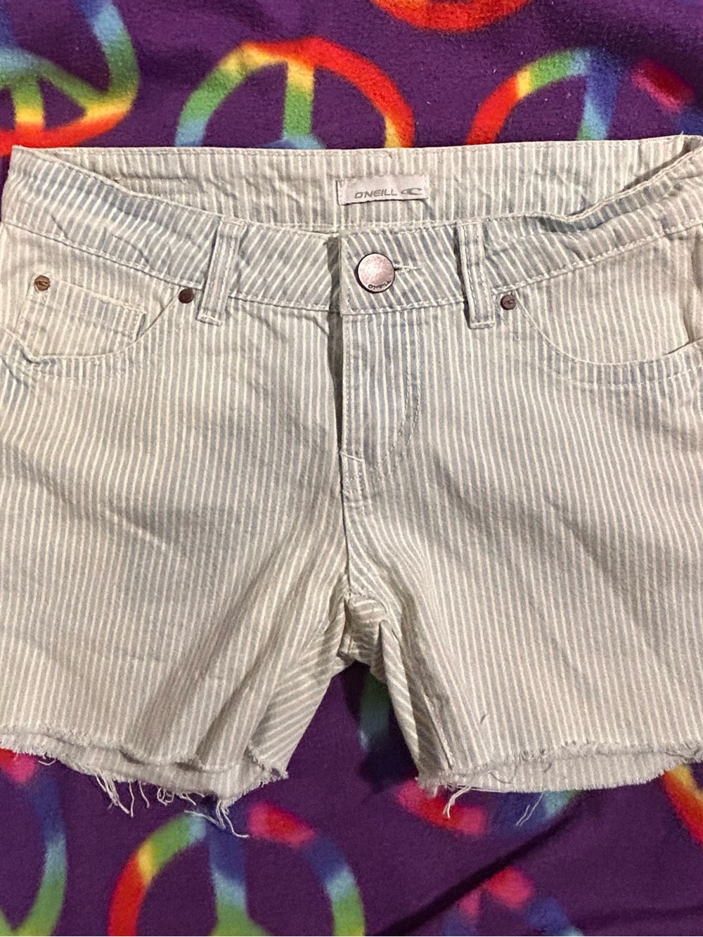 O'Neill Women's White and Light Blue Striped Denim Cutoff Shorts